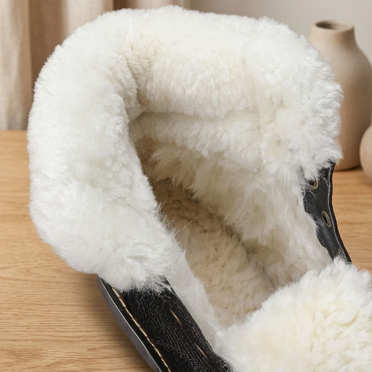 Men's leather winter boots on foot